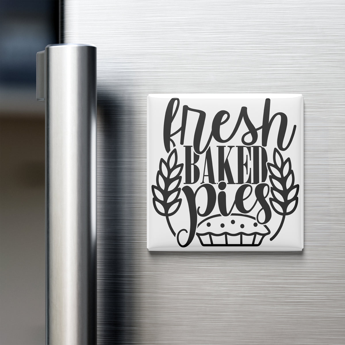 A refrigerator door with a magnet that says "fresh baked pies".