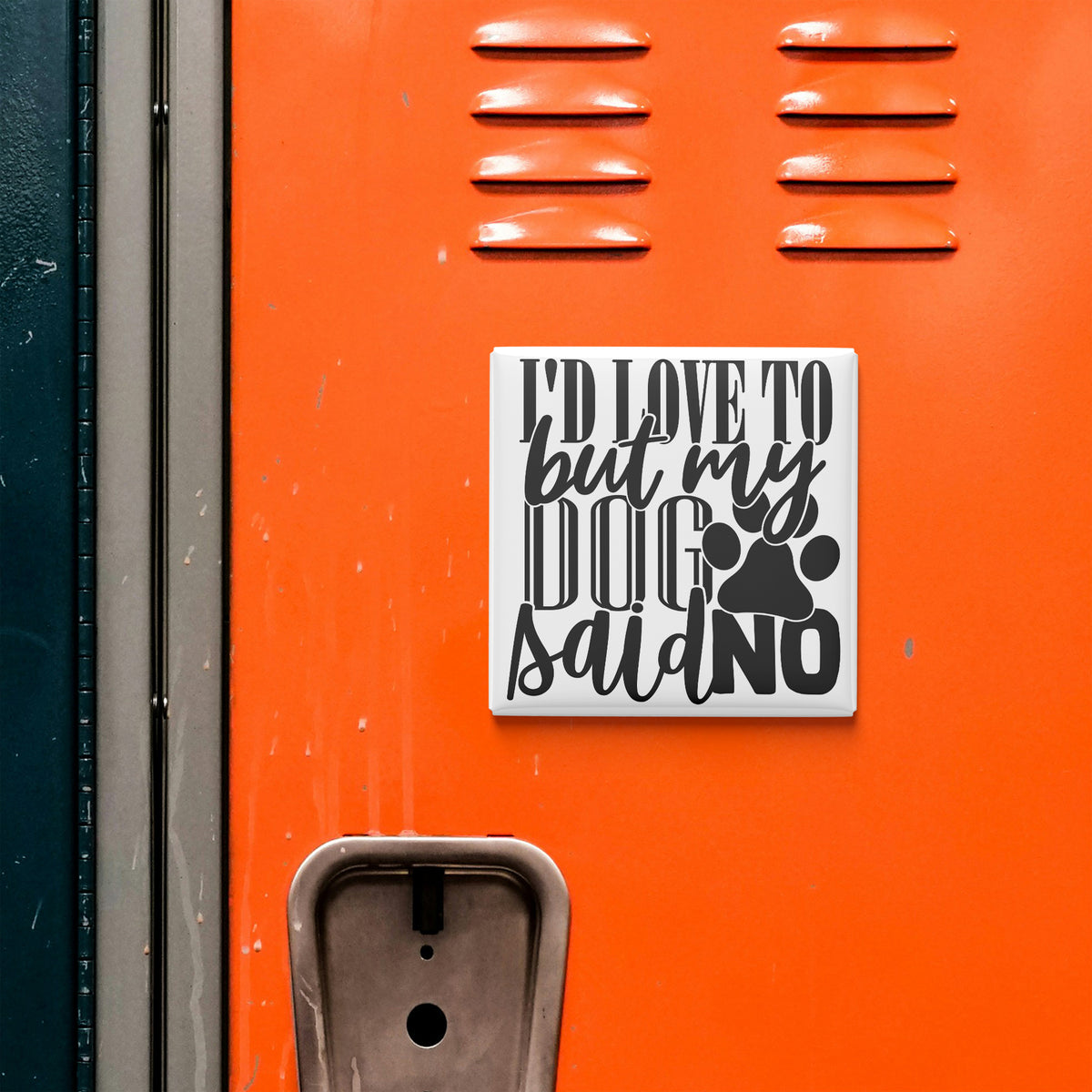 a sticker with the text "I'd love to but my dog said no" on an orange surface, which appears to be a locker or a similar storage unit.