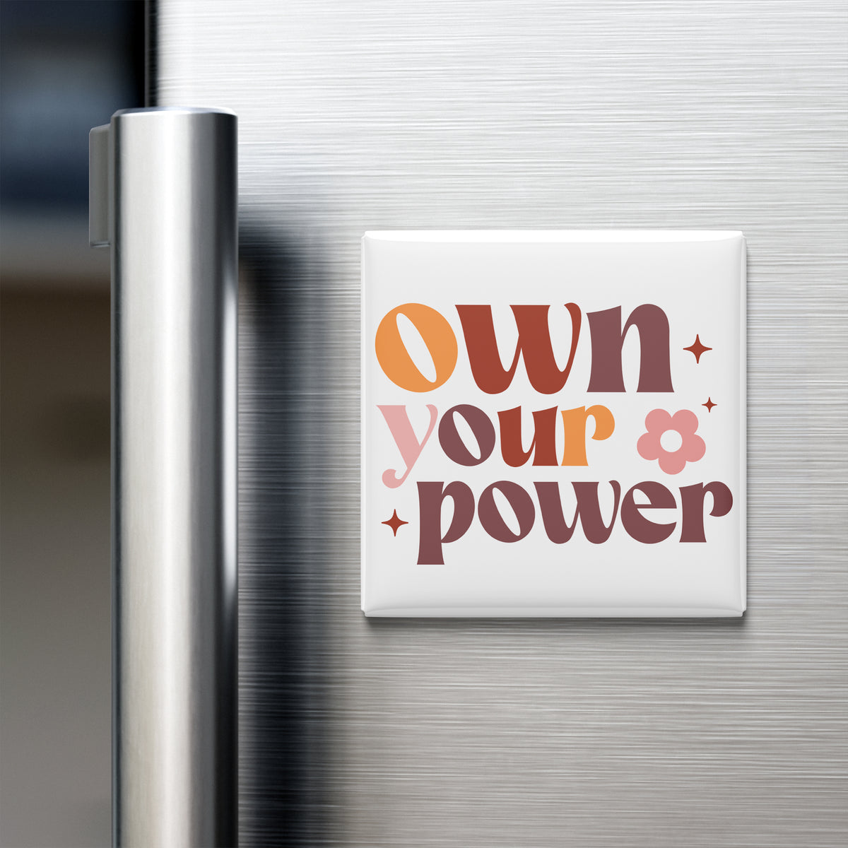 a refrigerator with a magnet that says "own your power".