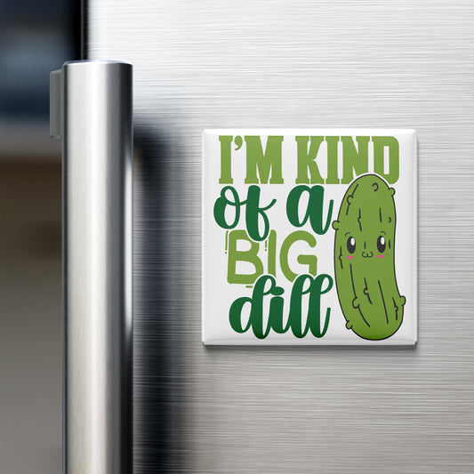 A refrigerator door with a humorous magnet that reads "I'm kind of a big dill".