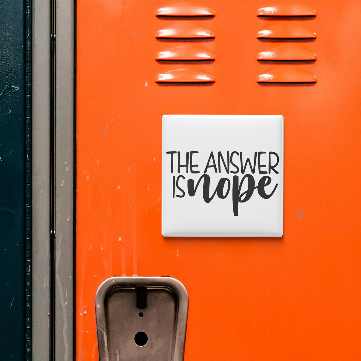 a bright orange locker with a sign that says "The answer is none".