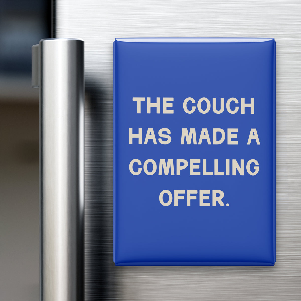 “The couch has made a compelling offer.” quote magnet displayed on a refrigerator