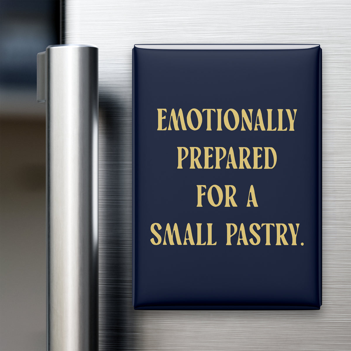 “Emotionally prepared for a small pastry.” quote magnet displayed on a refrigerator