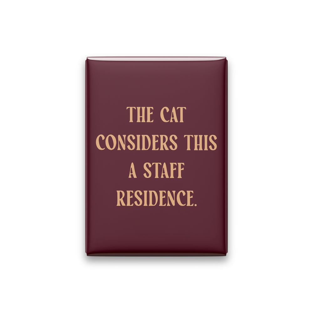 “The cat considers this a staff residence.” oxblood quote magnet on white