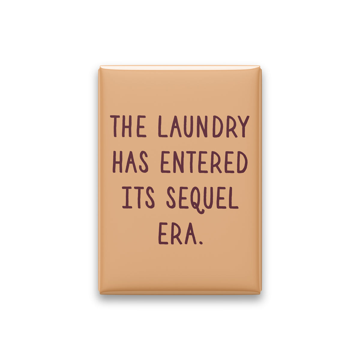 “The laundry has entered its sequel era.” apricot quote magnet on white