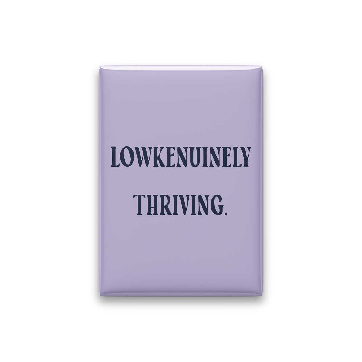 “Lowkenuinely thriving.” lilac quote magnet on white