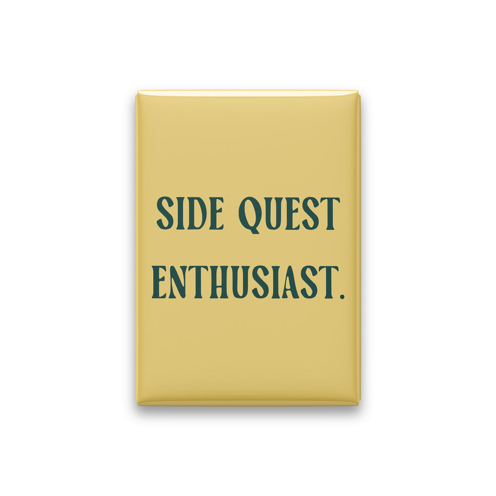 “Side quest enthusiast.” butter quote magnet on white