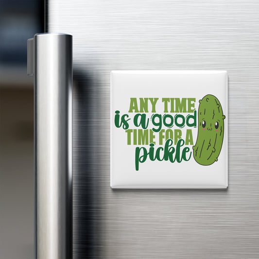 A white refrigerator magnet with a green pickle and the text "Any time is a good time for a pickle" printed on it.