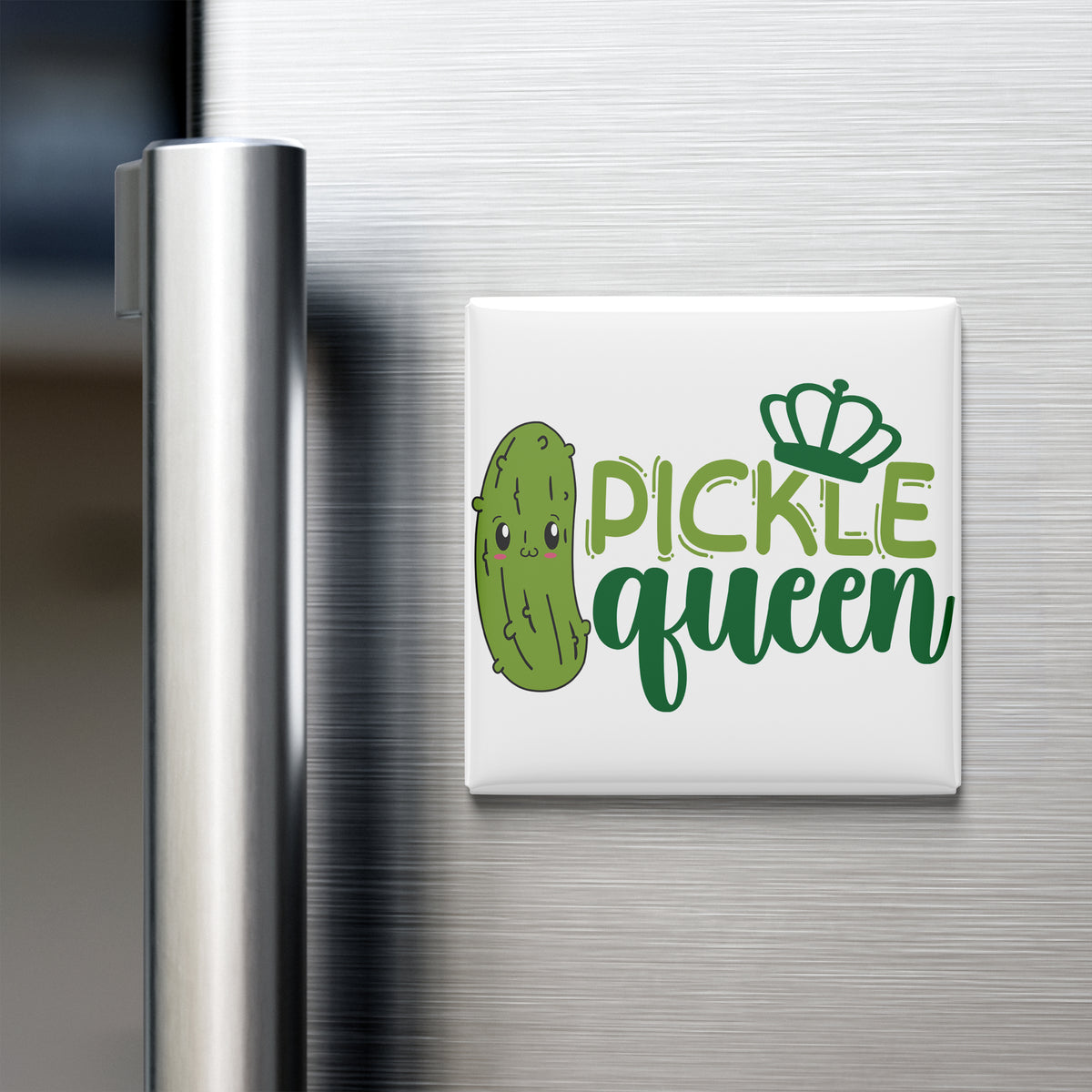 A refrigerator door with a magnet that says "Pickle queen" in a playful font.
