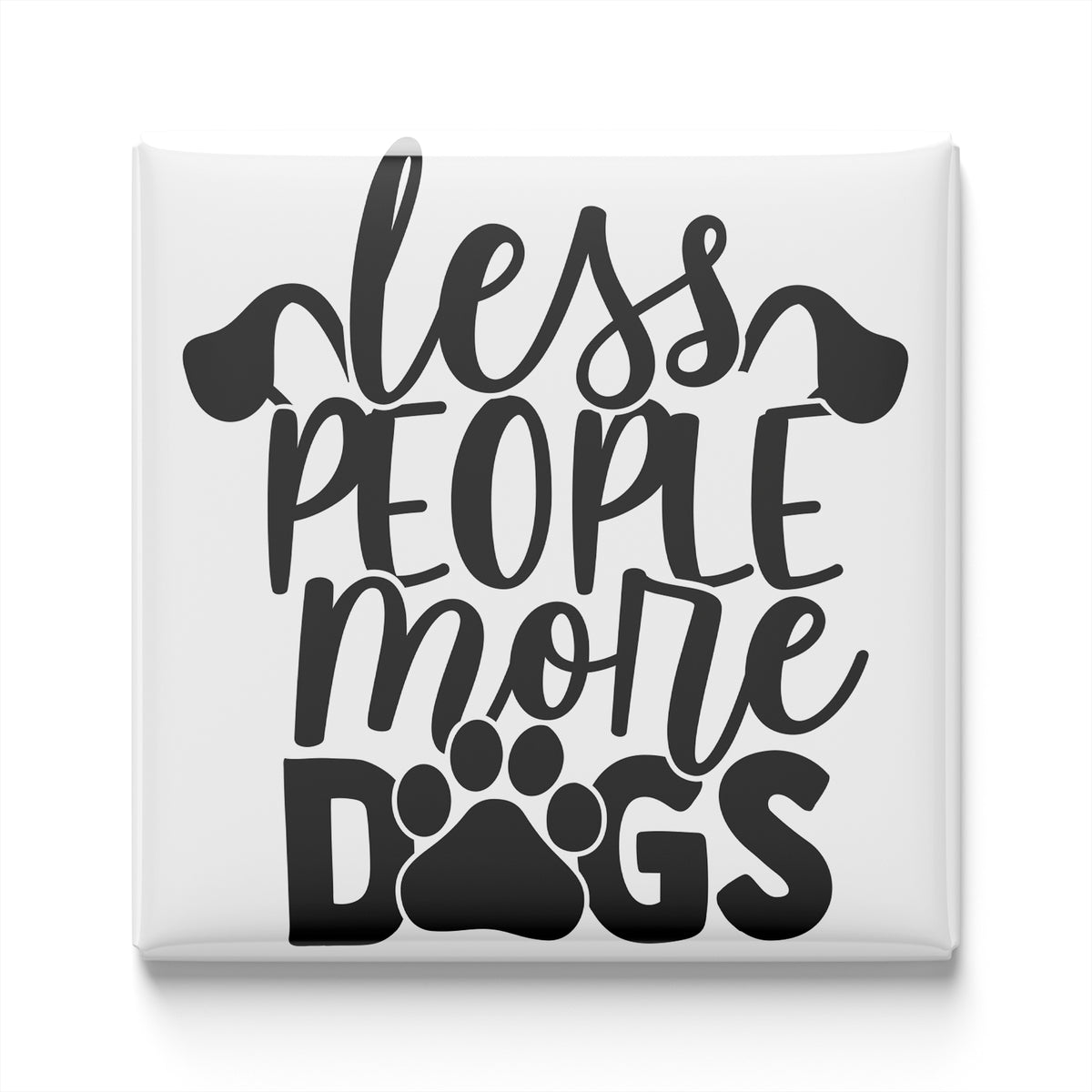 the text "less people more dogs" in a stylized font, with the word "dogs" represented by a paw print.