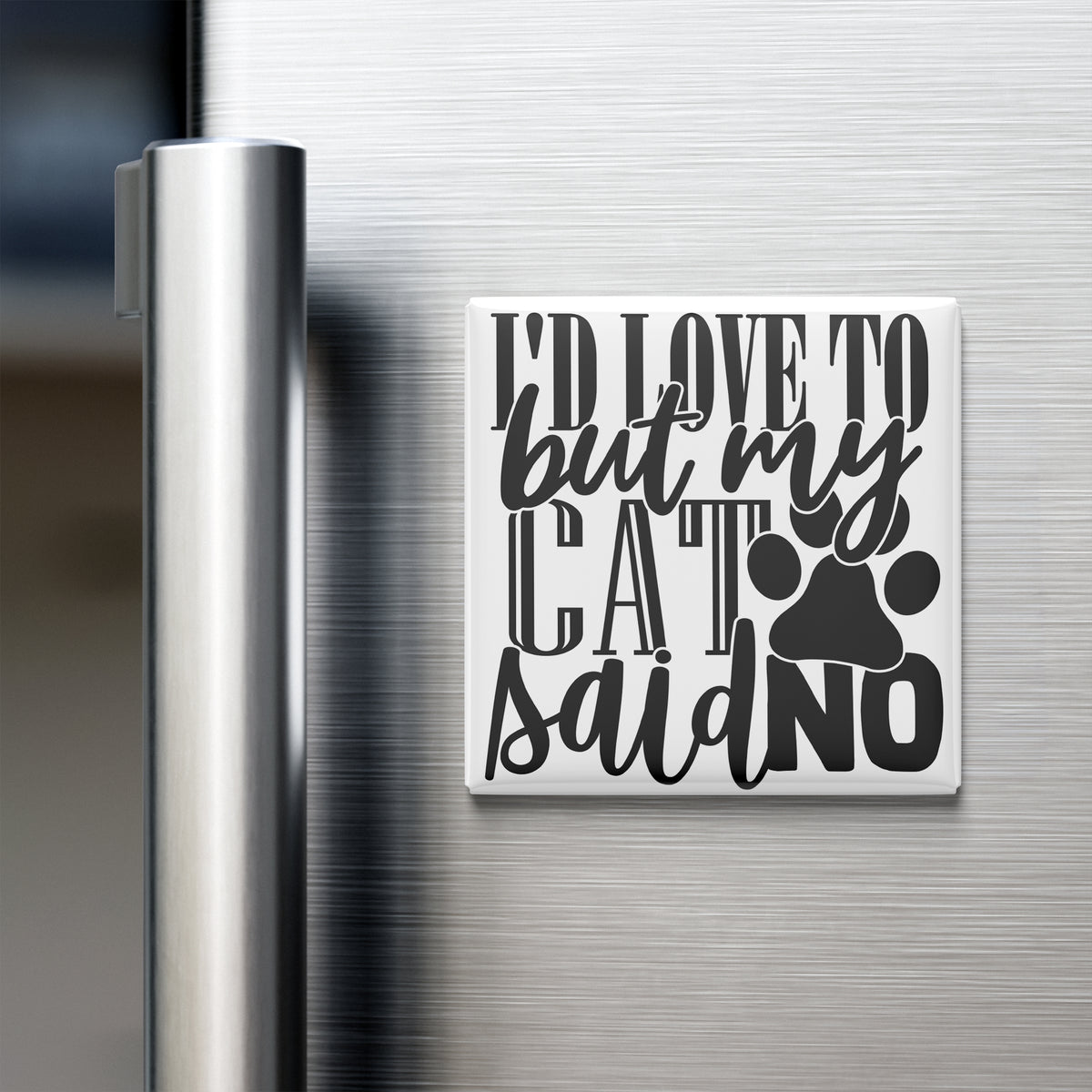 A white square magnet with black text on a silver refrigerator door.