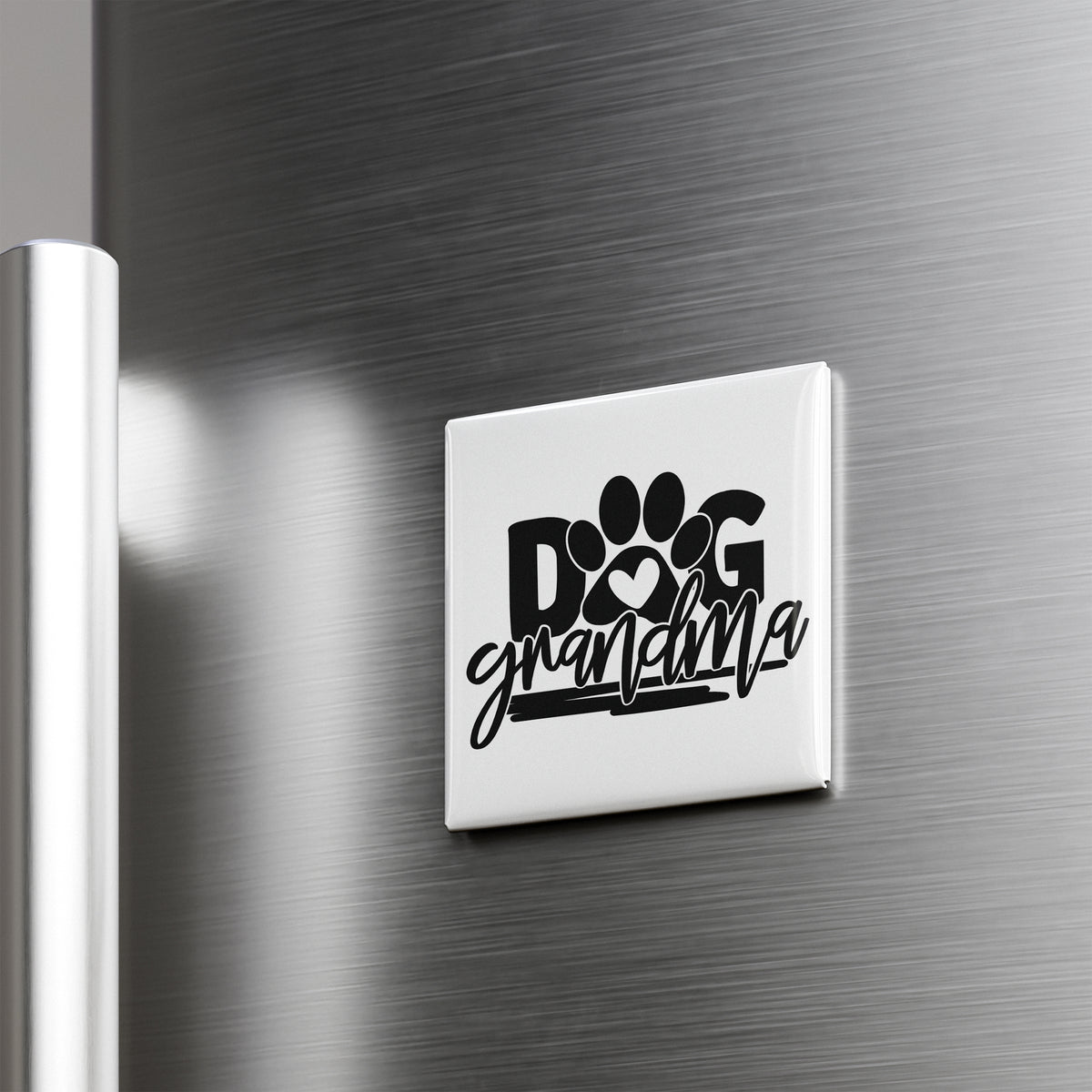 A refrigerator door with a sticker that says "DOG grandmothera" in a stylized font.
