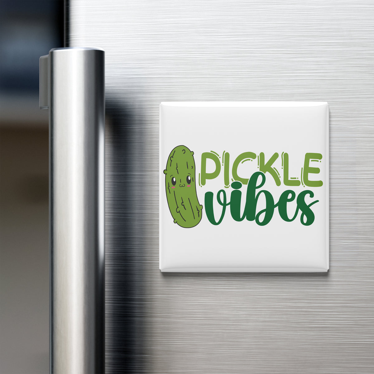 a refrigerator with a magnet that says "Pickle Vibes" in a playful, cartoonish font.