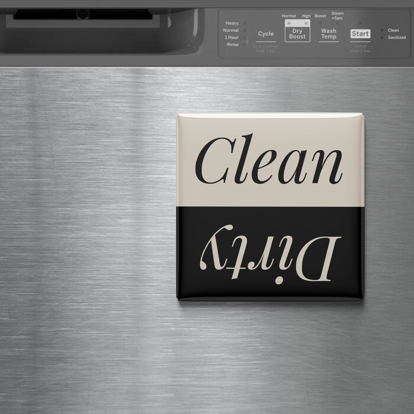 A black and white sign with the word "Clean" on it, placed on a stainless steel surface.