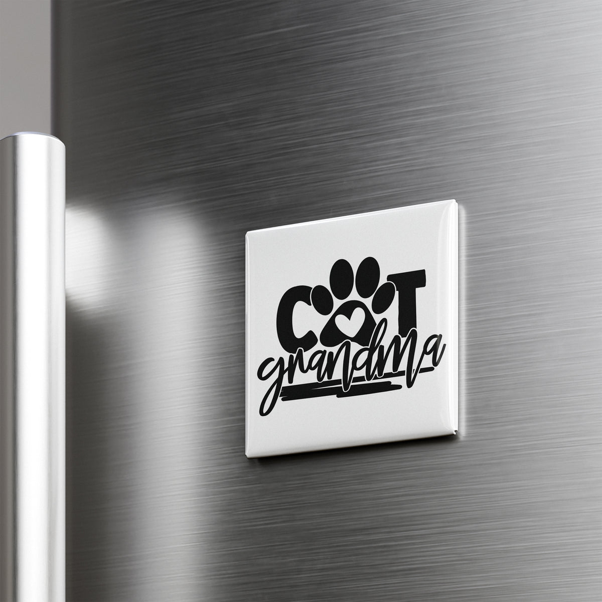 A refrigerator door with a sticker that says "COT grandmother" in a stylized font.