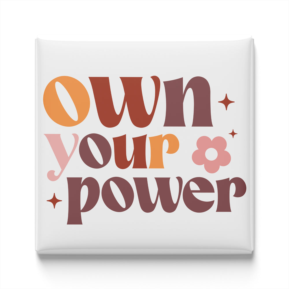 the text "own your power" in a stylized font, with the word "own" in a larger size and "your" in a smaller size. The text is surrounded by decorative elements such as stars and flowers, creating a visually appealing design.