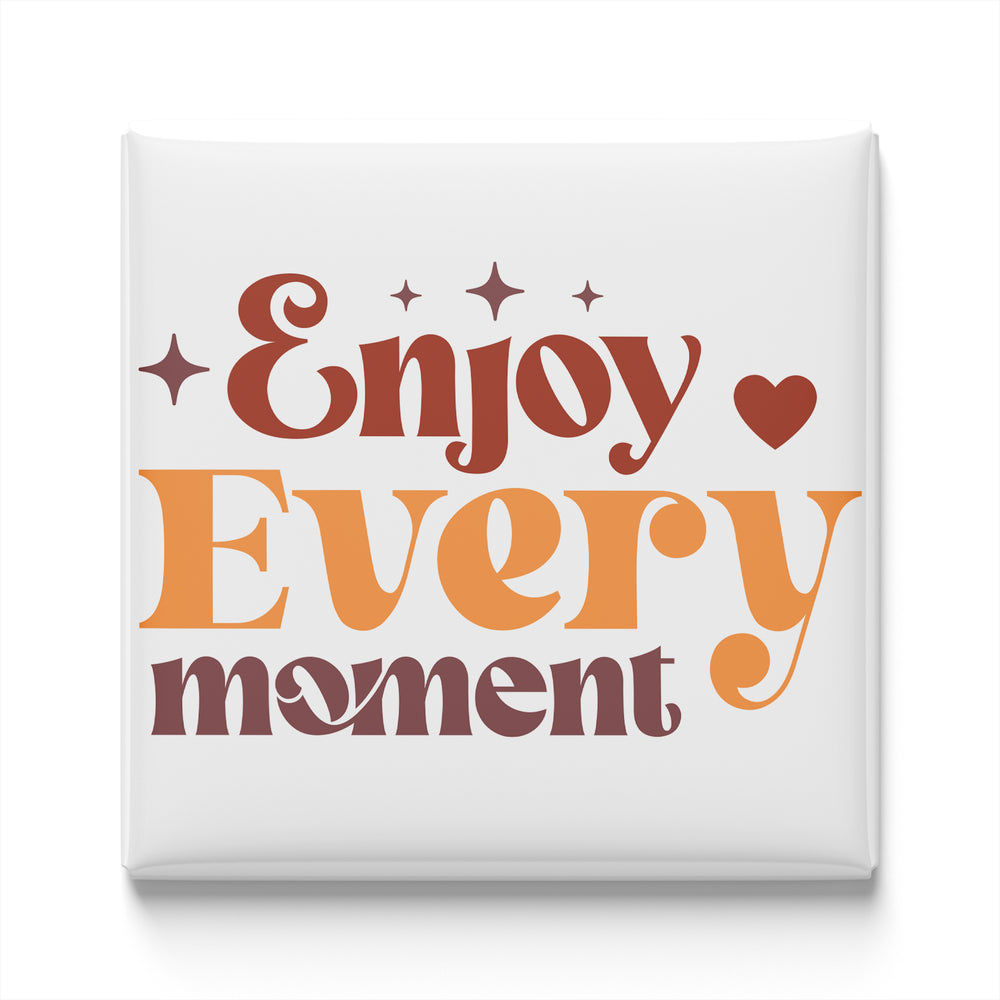 the text "Enjoy Every moment" in a stylized font, with a heart symbol and stars surrounding the text.