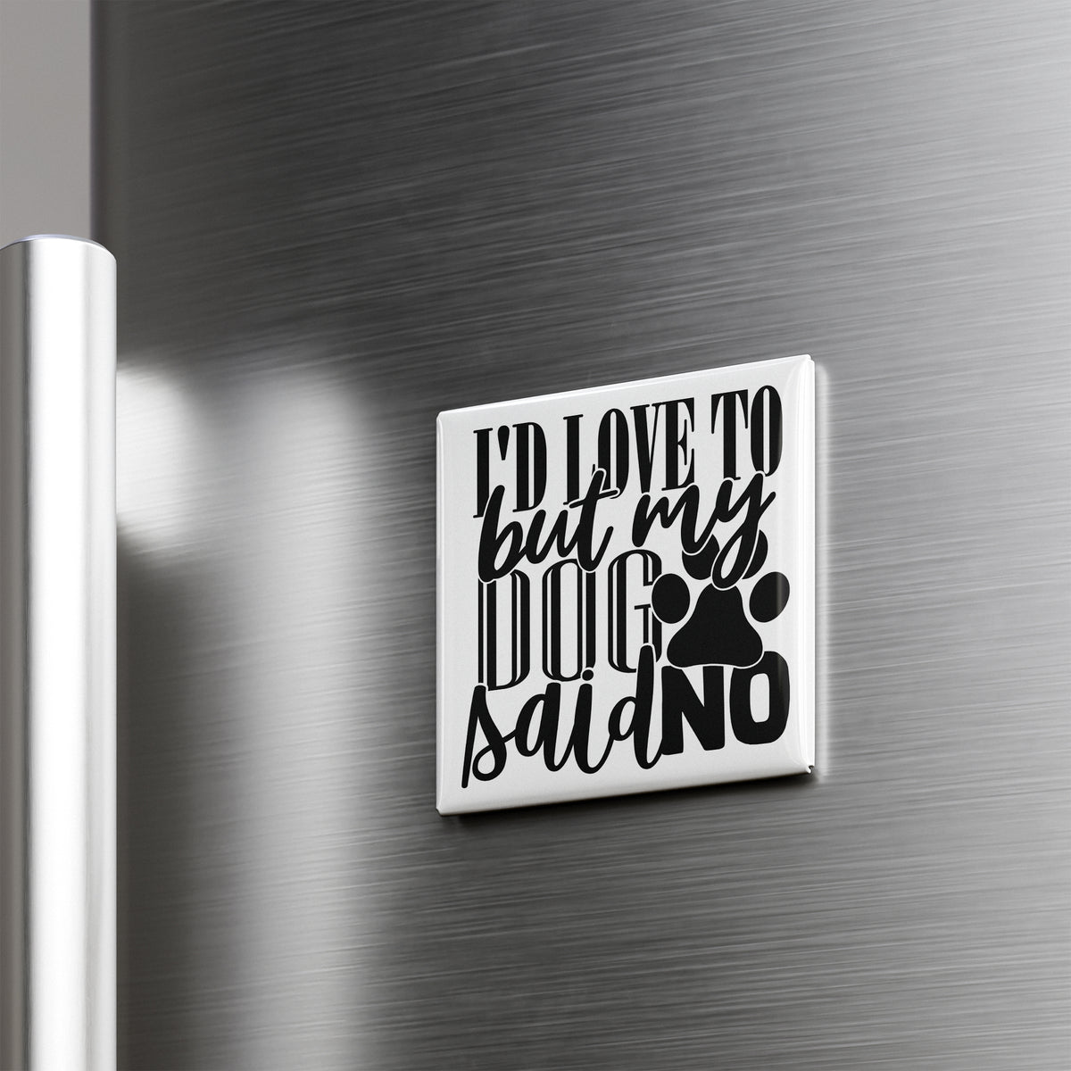 A white square magnet with black text that says "I'D LOVE TO BUY MY DOG SAIL NO" is attached to a metallic surface.