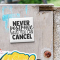 a sticker with the text "NEVER POSTPONE WHAT YOU CAN CANCELL" on a metal surface.