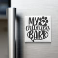 A white refrigerator magnet with the text "MY CHILDREN BARK" printed on it.