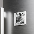 A white refrigerator door with a black and white graphic and text that says "fall days are fun days".