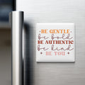 a refrigerator with a white magnet that displays the text "Be Gentle, be Bold, be Authentic, be Kind, be You".