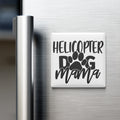 A refrigerator door with a magnet that says "HELICOPTER DOG MAMA" in a stylized font.