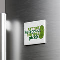 A white refrigerator magnet with a green pickle and the text "Any time is a good time for a pickle" printed on it.