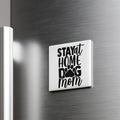 A white refrigerator magnet with the text "STAY AT HOME DOG MOM" printed on it.
