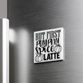 A white square magnet with the text "BUT FIRST PUMPKIN SPICE LATE" printed on it, mounted on a metallic surface.