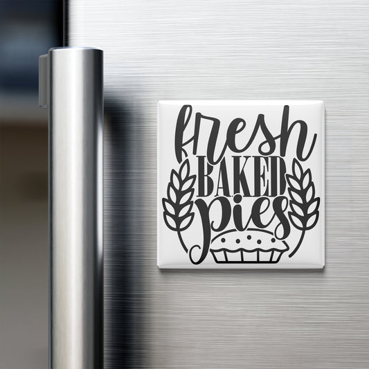 A refrigerator door with a magnet that says "fresh baked pies".