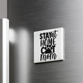 A white refrigerator door with a black and white sticker that says "STAY AT HOME COT MOM".