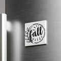 A white refrigerator magnet with the word "fall" written on it.