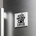 A refrigerator door with a magnet that says "wife mother cat lover" in a stylized font.