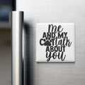 A white refrigerator magnet with the text "me and my Cott talk about you" printed on it.