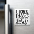A white refrigerator magnet with the text "I LOVE fall MOST of all" printed on it.