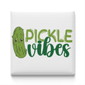 a green pickle with a face and the text "Pickle Vibes" written below it.