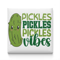 A cartoon image of a pickle with a text overlay that says "PICKLES PICKLES VIBES".
