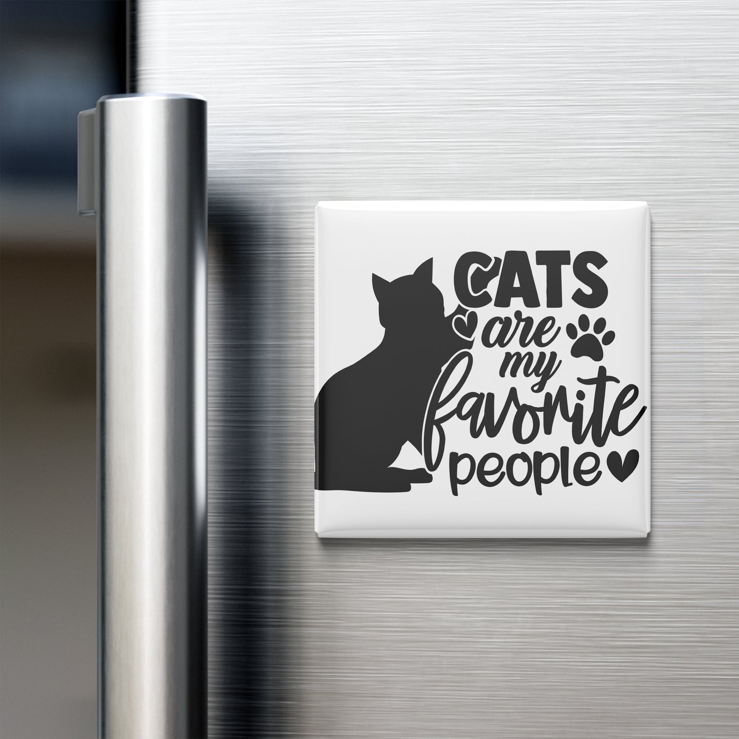 A white refrigerator magnet with the text "CATS are my favorite people" and a silhouette of a cat.