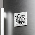 A white square magnet with the text "live love smile" written in a decorative font.
