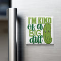A refrigerator door with a humorous magnet that reads "I'm kind of a big dill".