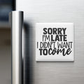 a refrigerator with a humorous magnet that reads "Sorry I'm late I didn't want to come".