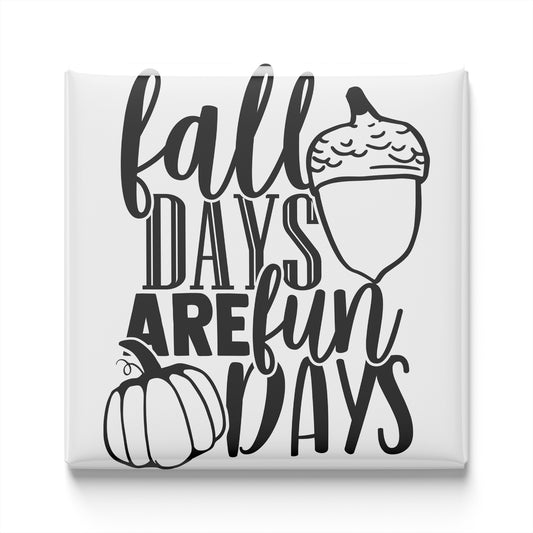 a graphic design with the text "fall days are fun days" and an illustration of a pumpkin and an acorn.