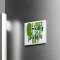 A humorous refrigerator magnet with the text "I JUST REALLY LIKE PICKLES OK?" and a cartoon image of a pickle.