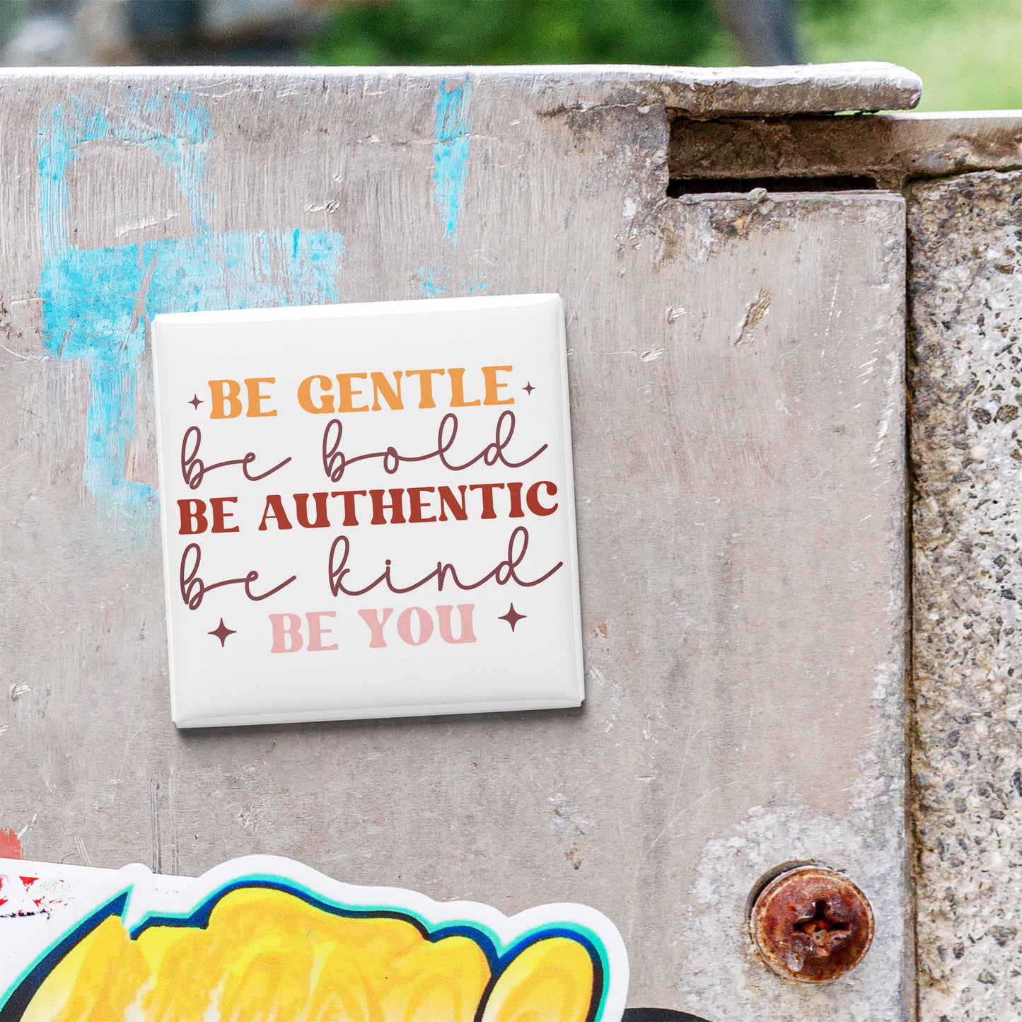 a sticker with the text "Be Gentle, be Bold, be Authentic, be Kind, be You" on a metal surface.