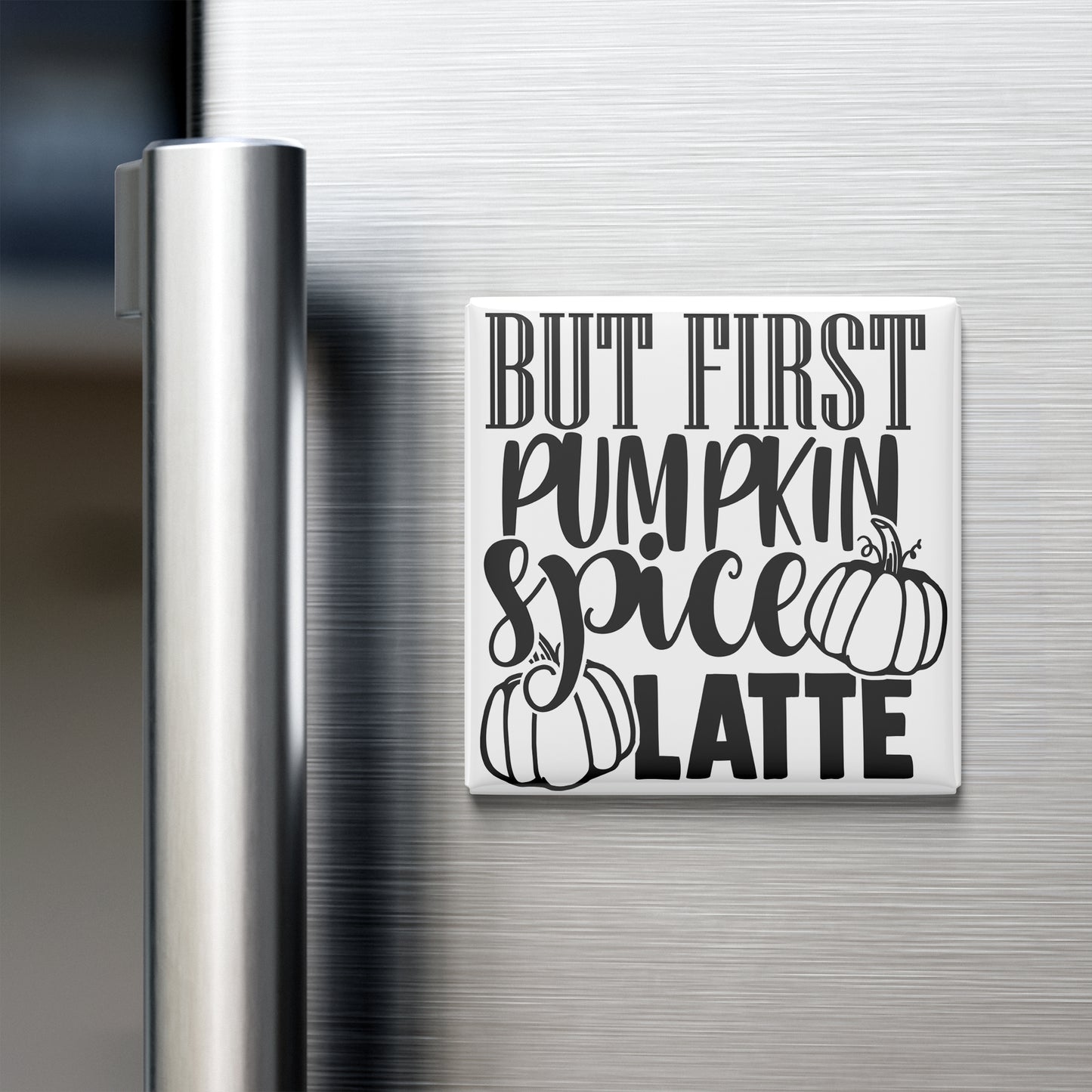 A white refrigerator magnet with the text "BUT FIRST PUMPKIN SPICE LATE" printed on it.