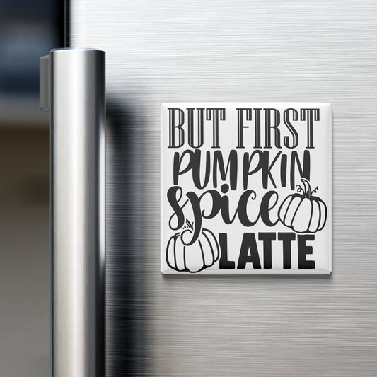 A white refrigerator magnet with the text "BUT FIRST PUMPKIN SPICE LATE" printed on it.