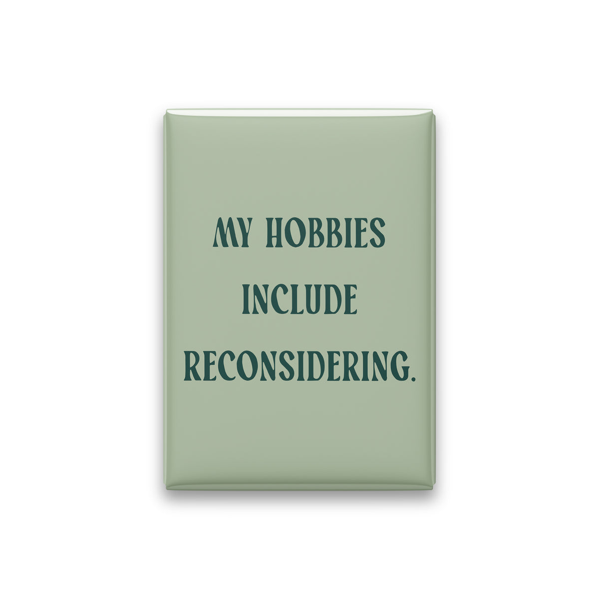“My hobbies include reconsidering.” sage quote magnet on white