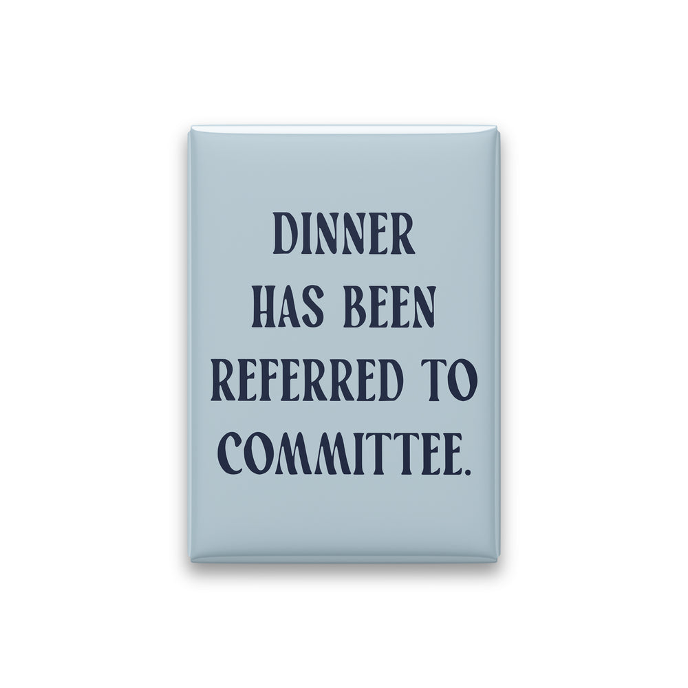 “Dinner has been referred to committee.” powder quote magnet on white