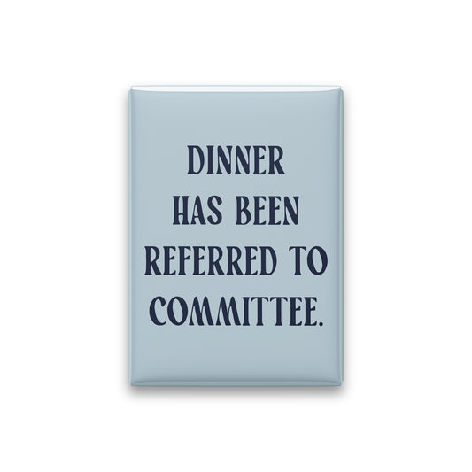 “Dinner has been referred to committee.” powder quote magnet on white